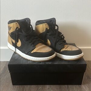 Jordan Sneakers Black and Gold High-Top Style
